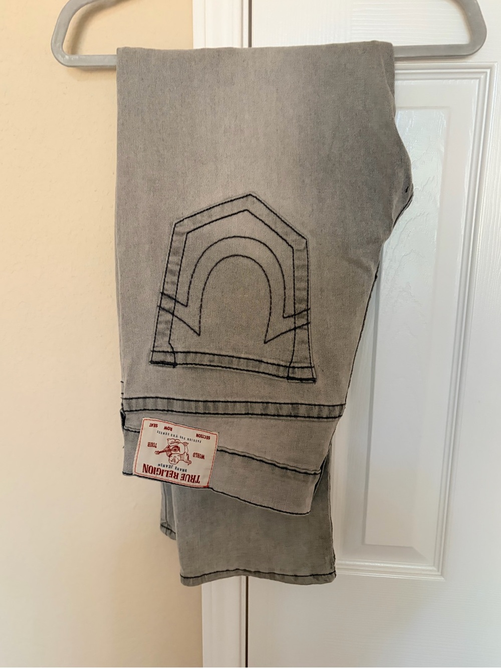True Religion Men’s Light Gray Bootcut Jeans with Signature Back Stitching
